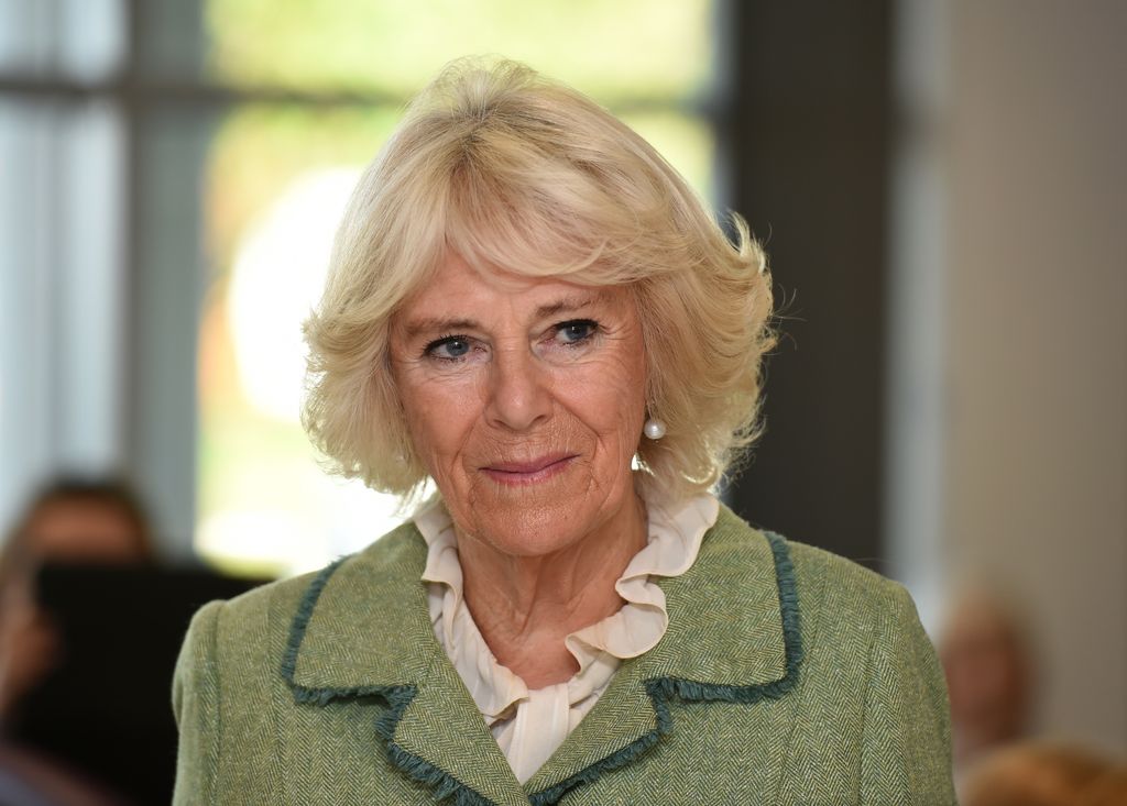 Queen Camilla wearing green