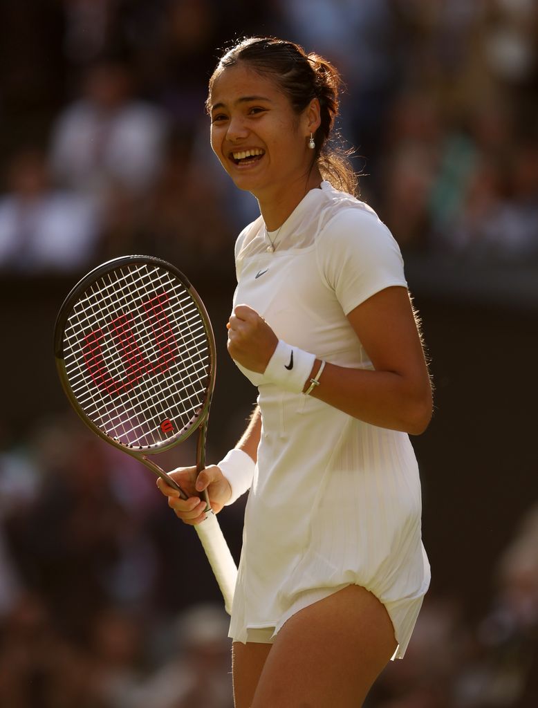 Emma Raducanu of Great Britain celebrates victory against Alison Van Uytvanck of Belgium in the Women's Singles First Round match during Day One of The Championships Wimbledon 2022 at All England Lawn Tennis and Croquet Club on June 27, 2022 in London, England. (Photo by Julian Finney/Getty Images)