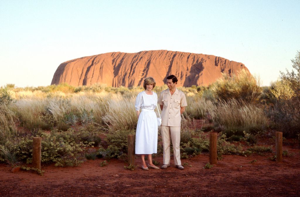 King charles and princess diana in white dresss visiting  Ayres Rock Australia