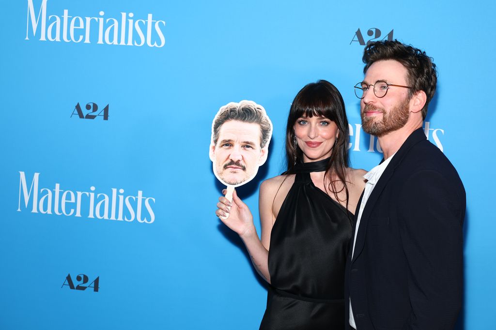 Chris, Dakota, and 'Pedro' on the red carpet