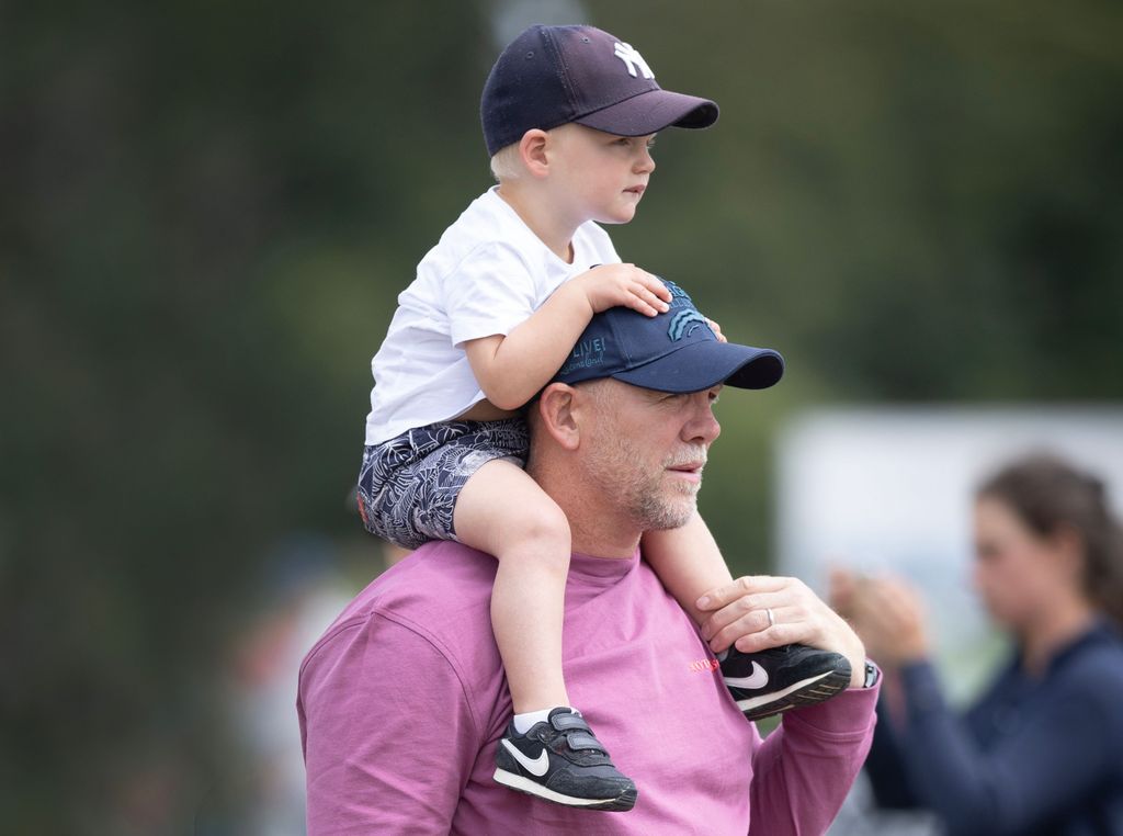 Lucas Tindall sitting on dad Mike's shoulders