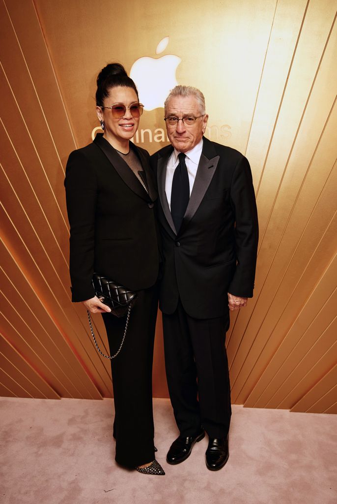 Tiffany Chen (L) and Robert De Niro attend the Apple Original Films Oscars celebration at the Sunset Tower Hotel on March 10, 2024 in Los Angeles, California.