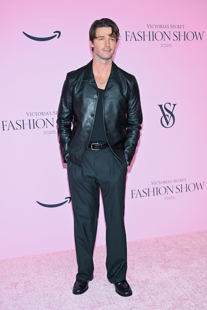 Patrick Schwarzenegger in black pants and leather jacket at Victoria's Secret Fashion Show 2025 