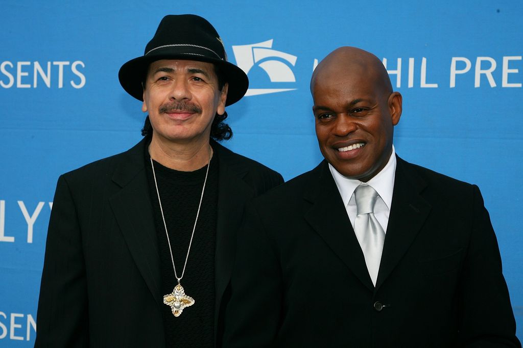 Musician Carlos Santana (L) and singer Jubilant Sykes (R) arrive at the 2006 Hollywood Bowl Hall of Fame Inductees Concert at the Hollywood Bowl on June 23, 2006 in Los Angeles, California