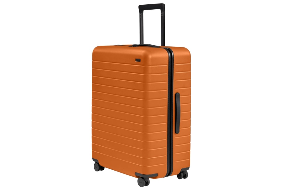  Away Checked Hardside Suitcase in orange to stand out