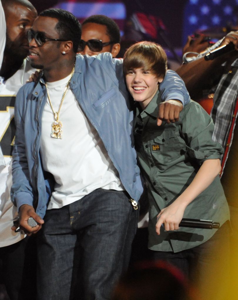 Sean "Diddy" Combs and Justin Bieber perform together in 2010