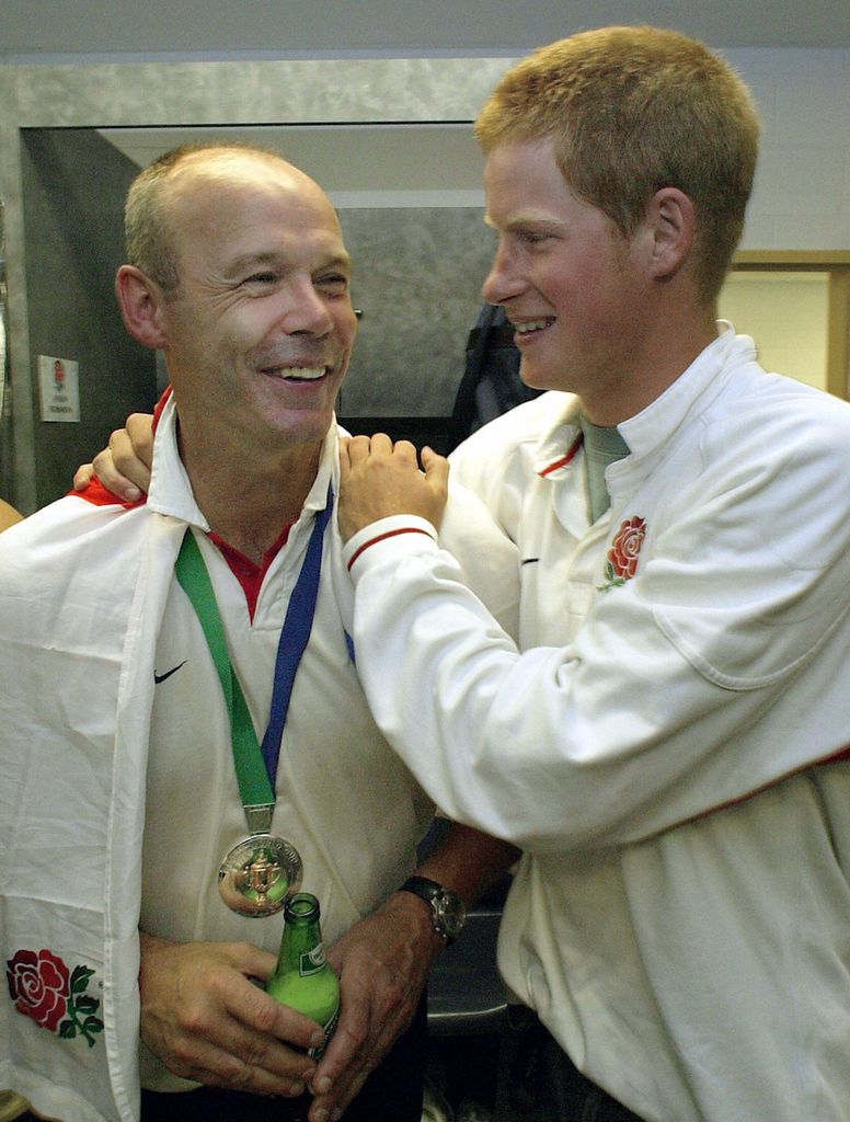 Prince Harry congratulates coach Clive Woodward at the Rugby World Cup 2003