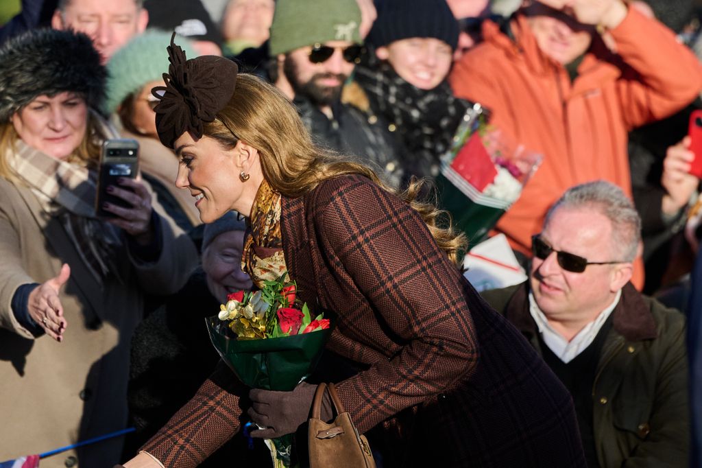 Kate Middleton holding flowers on Christmas Day