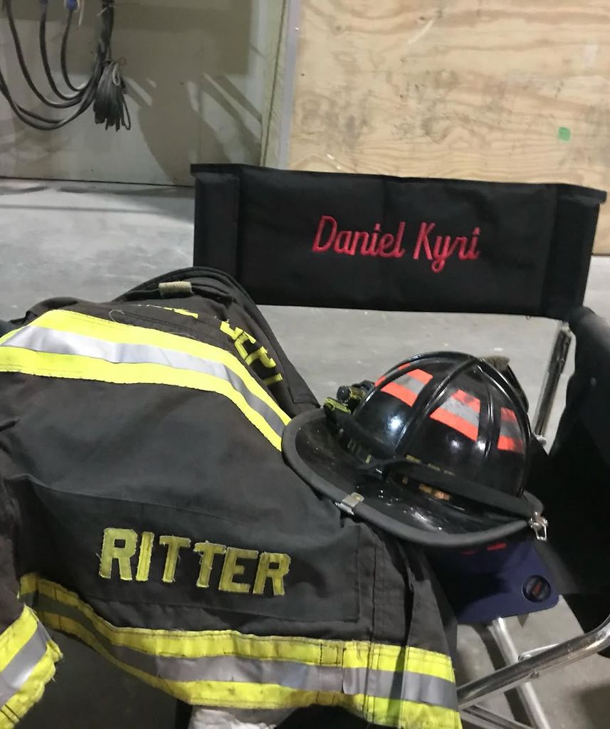 Picture taken by Daniel Kyri of set chair and turnout coat on set of Chicago Fire