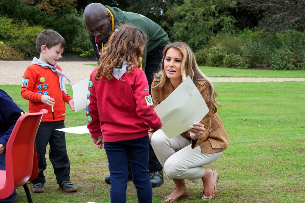 Melania Trump with a group of children