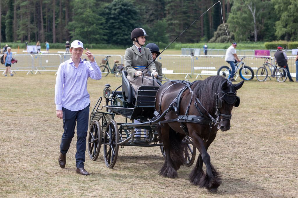 Lady Louise Windsor being supported at the Sandringham Horse Driving Trials in Norfolk
