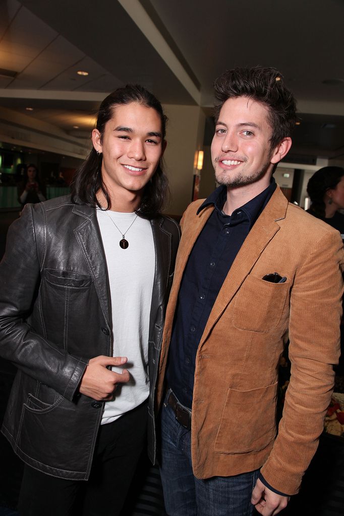 Booboo Stewart and Jackson Rathbone pose together 