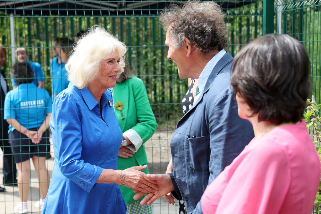 queen camilla shaking hands with Monty Don 
