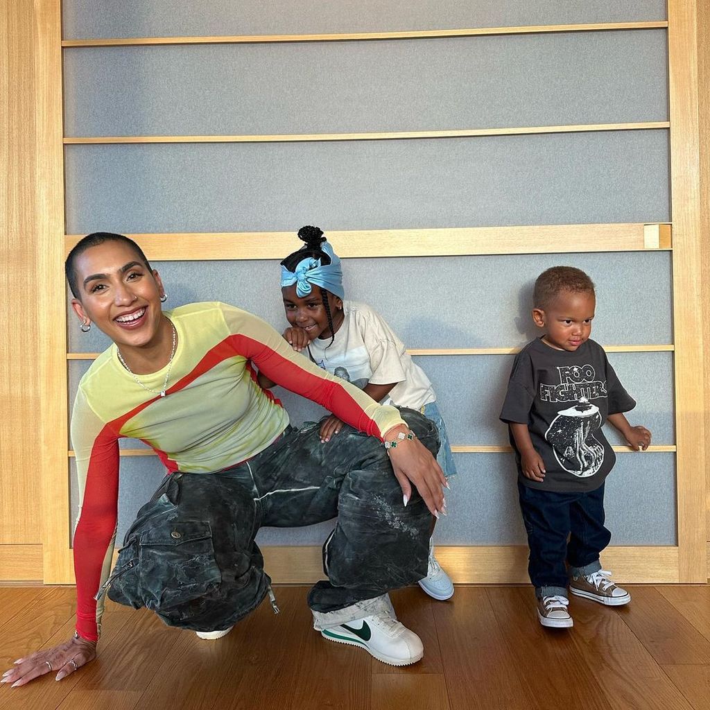 Kendrick Lamar's fiancée Whitney Alford and their two children Uzi and Enoch in the middle of play, shared on Instagram