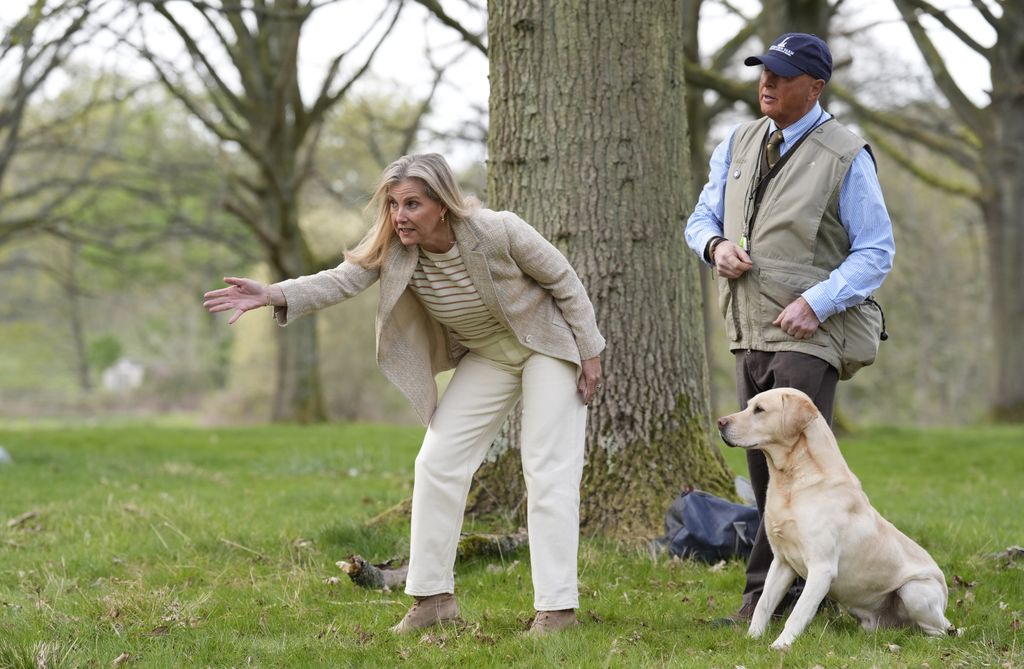 The Duchess of Edinburgh takes part in a gundog demonstration during a visit to The Yellow Labrador Club 