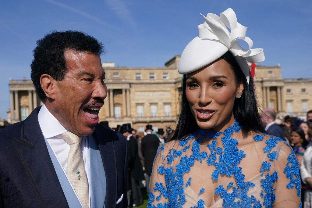 US singer Lionel Richie and partner Lisa Parigi outside Buckingham Palace