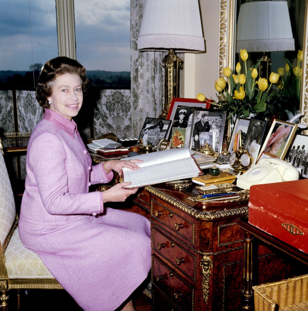 Queen Elizabeth II in the sitting room at Windsor Castle