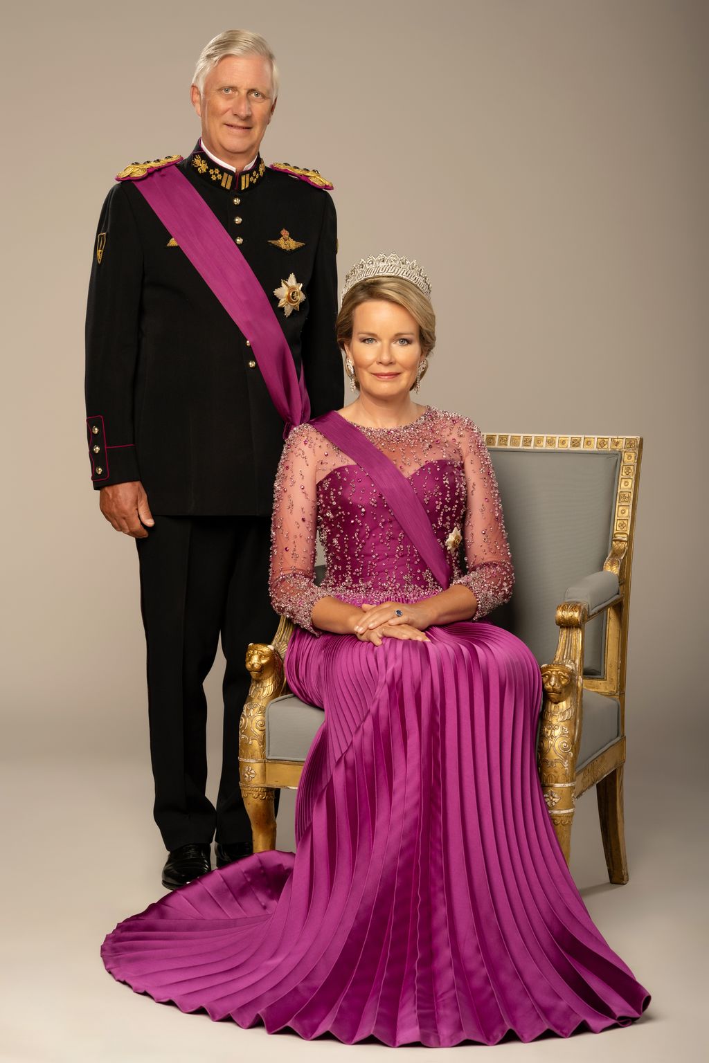 King Philippe and Queen Mathilde seated for portrait