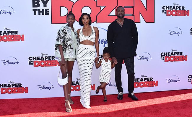 Gabrielle Union and Dwyane Wade with their daughters