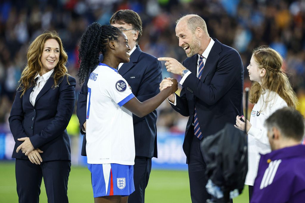 Britain's Prince William congratulates England's Michelle Agyemang after the Women's Euro 2025 final 