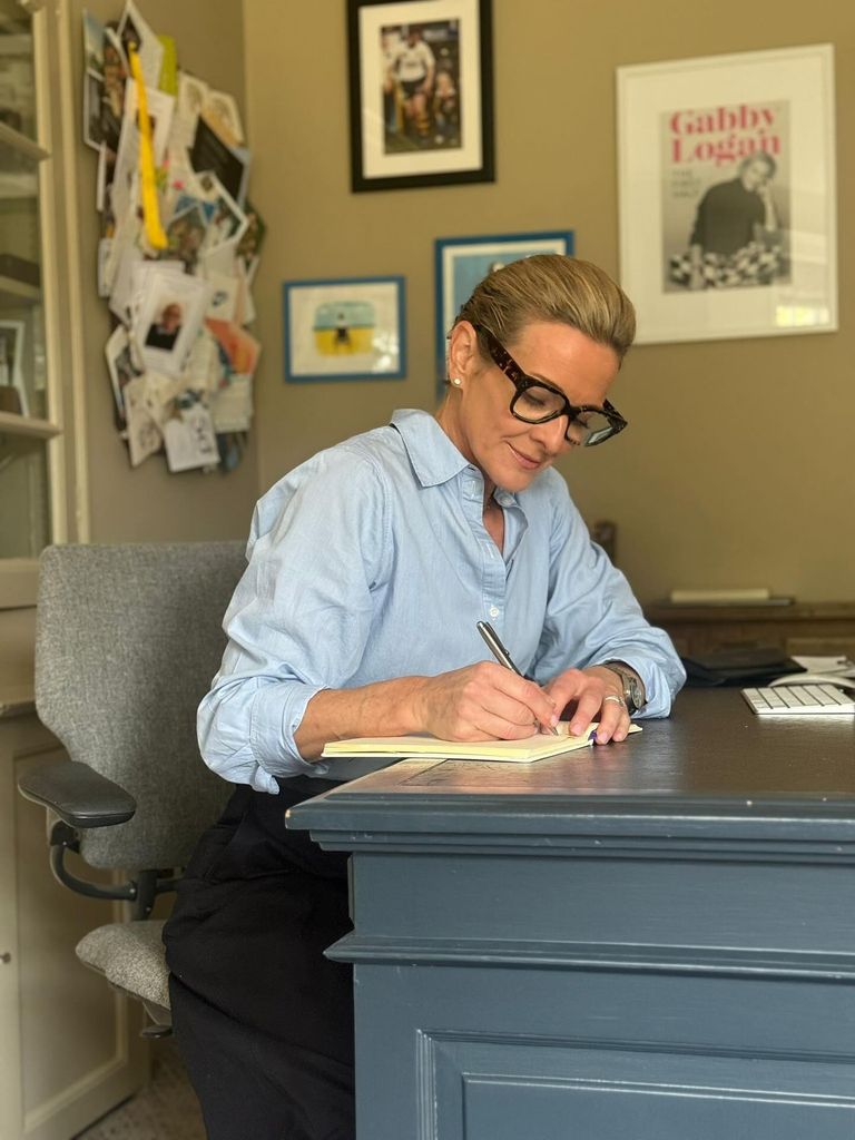 Gabby Logan working in her home office