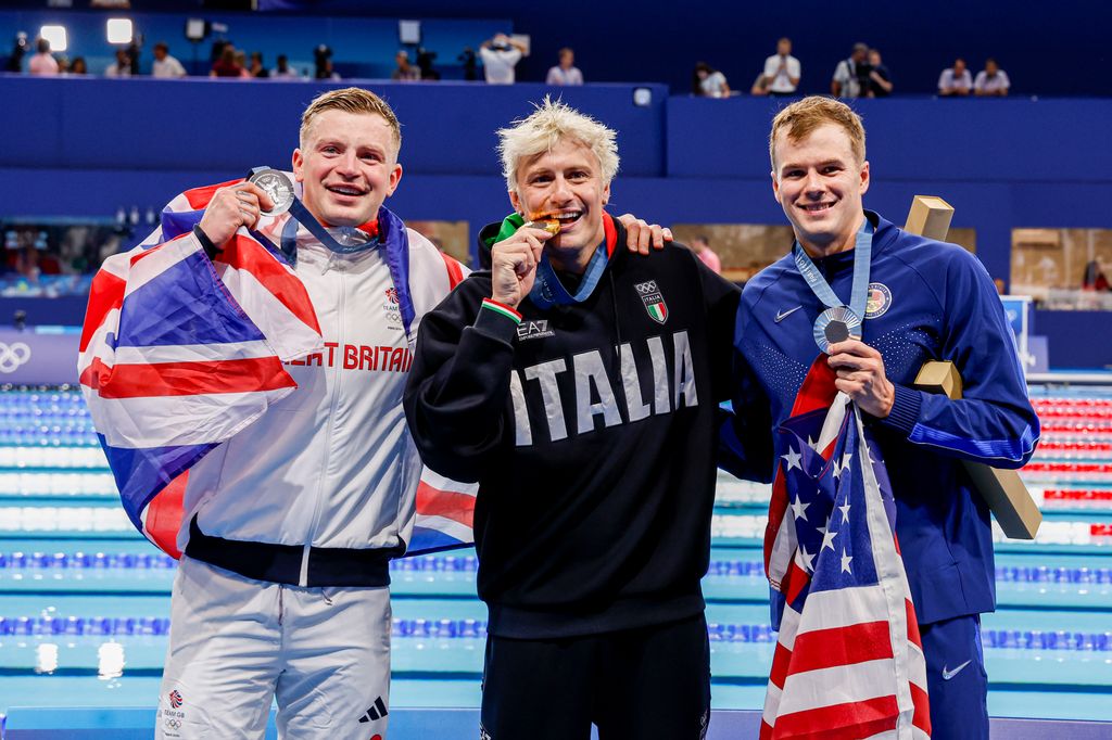 Winner Nicolo Martinenghi of Italy and second Adam Peaty of Great Britain and third Nic Fink of United States of America