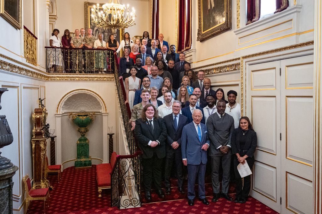 King Charles III poses with attendees including Idris Elba, founder of the Elba Hope Foundation and an alumnus of the King's Trust, Prime Minister Sir Keir Starmer (2ndL), Home Secretary Yvette Cooper (3rd row L), Culture Secretary Lisa Nandy (3rd row R), at the Youth Opportunity Summit, with young people, youth organisations, government officials, and representatives from the sports, education and arts sectors at St James's Palace on July 15, 2025 in London, England