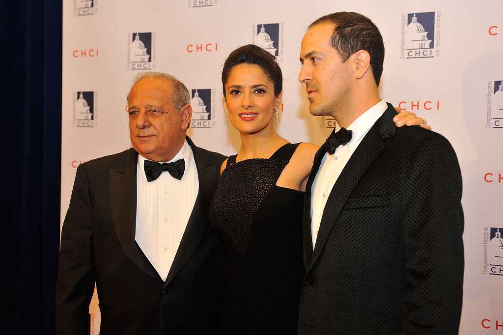 Salma Hayek poses for a photo with her father, Sami, left and her brother, Sami Junior, right, at the Congressional Hispanic Caucus Institute 2013 gala at The Walter E. Washington Convention Center on October 2, 2013 in Washington, DC