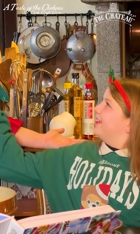 Dorothy Strawbridge sitting in their kitchen