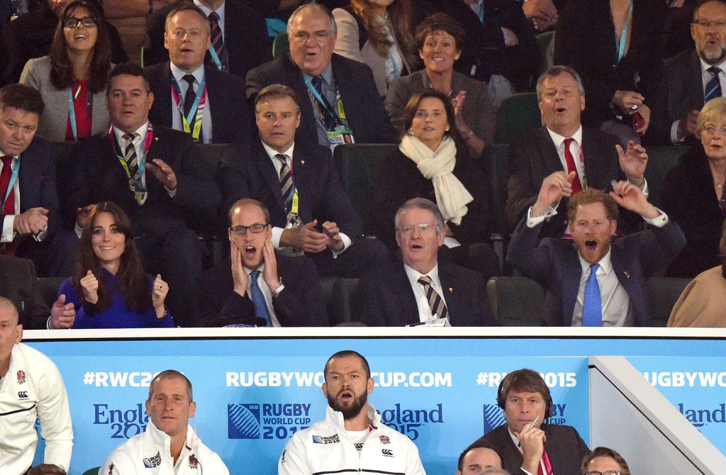 Prince Harry, Princess Kate and Prince William watching the rugby