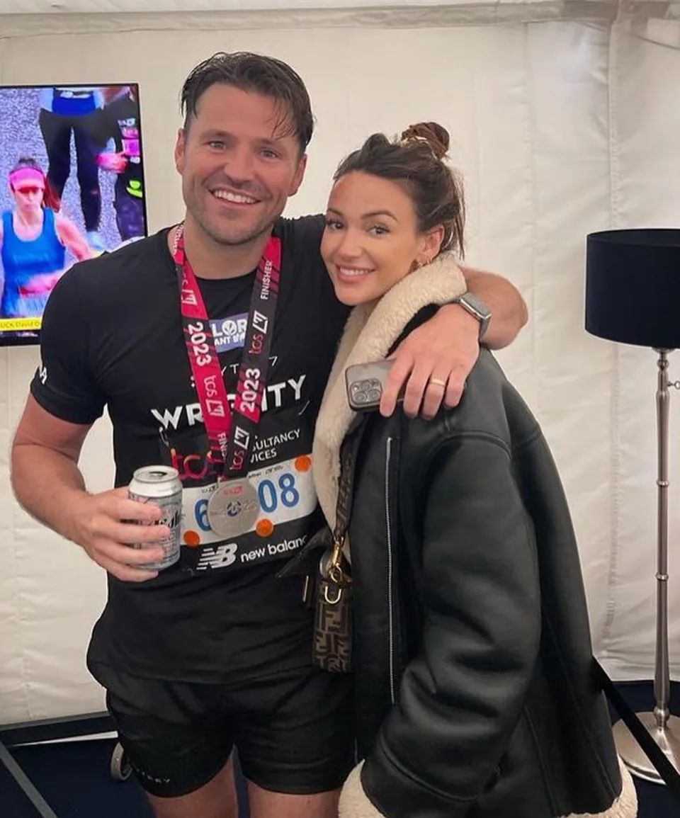 A photo of Mark Wright and Michelle Keegan after the London Marathon