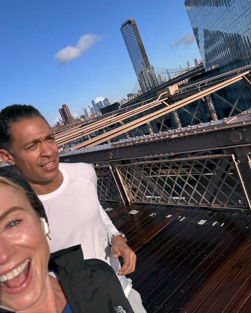 Amy Robach and T.J. Holmes running across Brooklyn Bridge