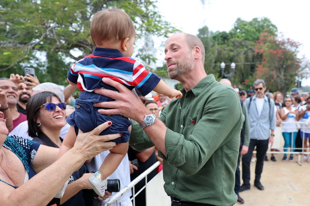 Prince William meets 10 month old Joaquim Monteiro on a visit to Paqueta Island during day two of his visit to Brazil