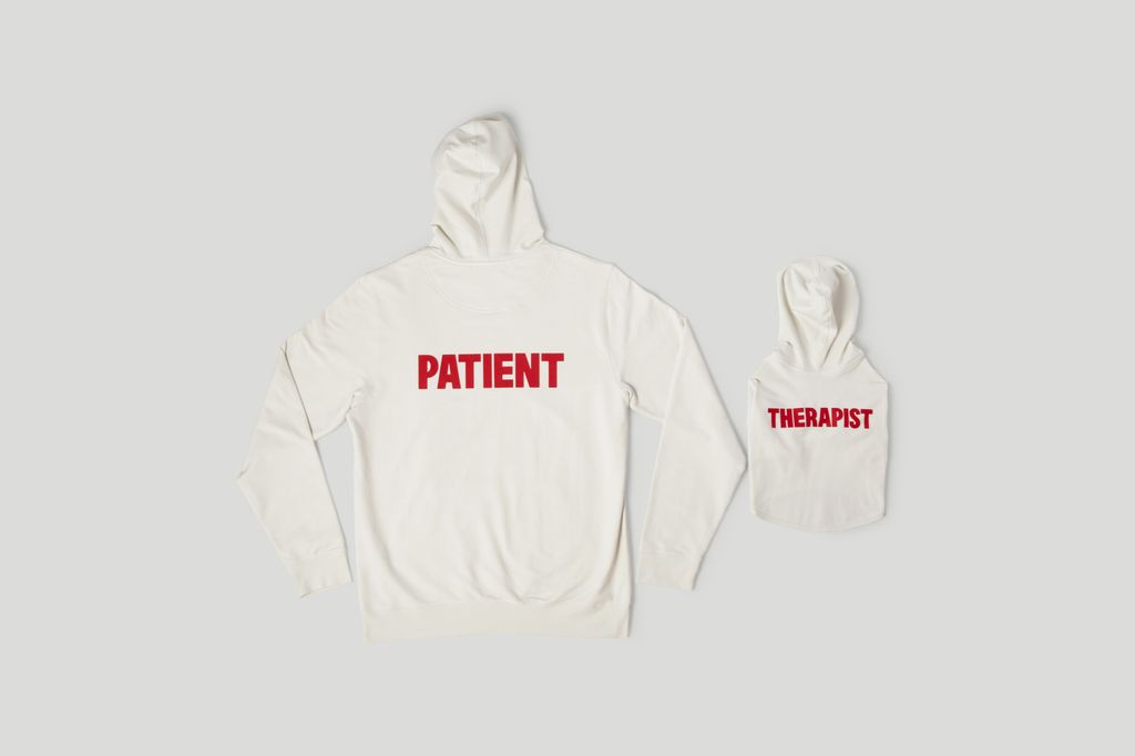 Adult swerater that says 'patient' and a dog sweater that says 'therapist'