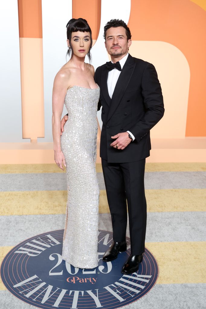 Katy Perry and Orlando Bloom attend the 2025 Vanity Fair Oscar Party Hosted By Radhika Jones at Wallis Annenberg Center for the Performing Arts on March 02, 2025 in Beverly Hills, California.