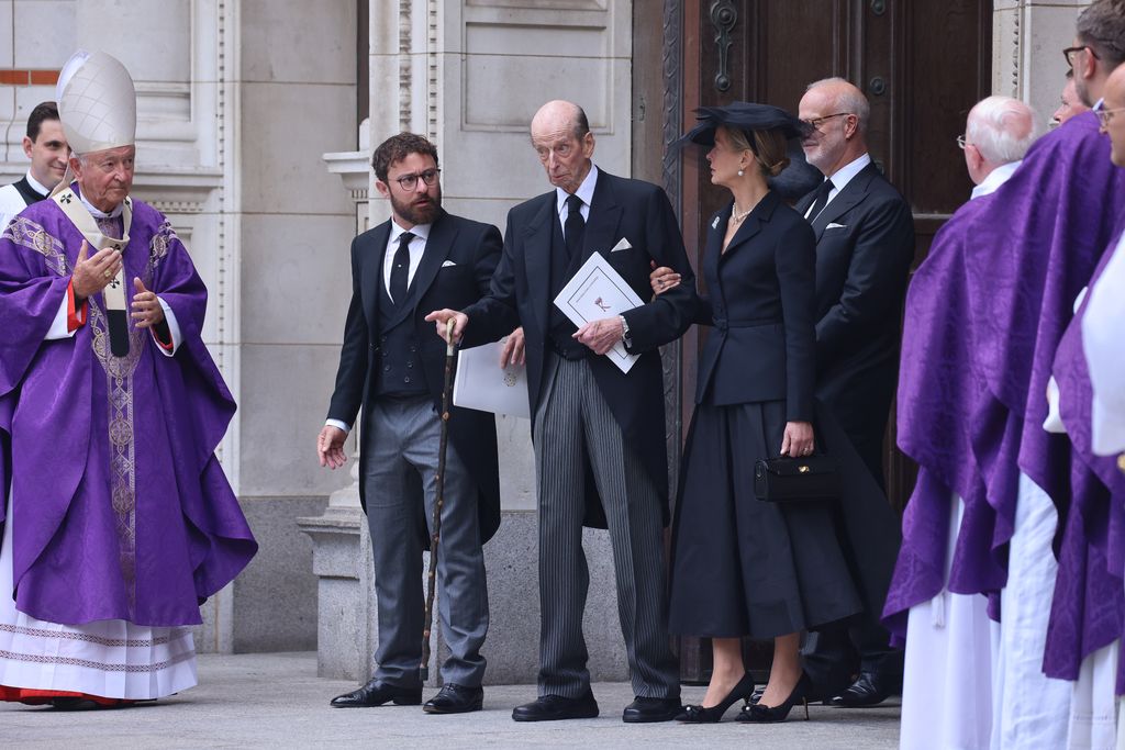 Prince Edward, The Duke of Kent is supported by his daughter and gradson as he leaves the funeral of his wife