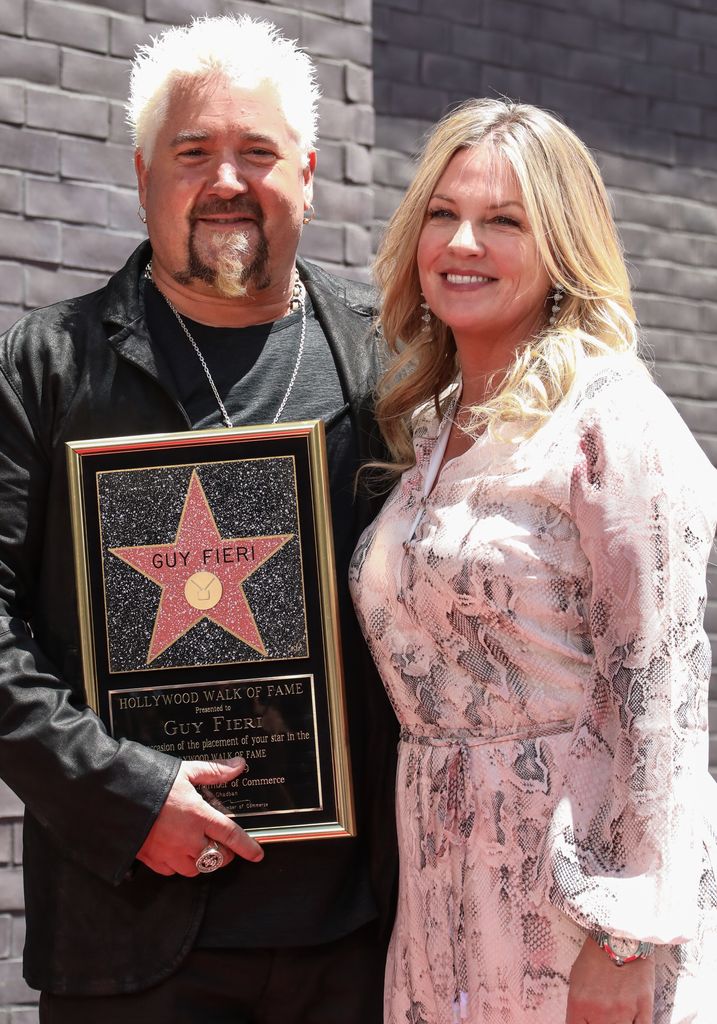 Chef / TV Personality Guy Fieri and his Wife Lori Fieri attend the ceremony to honor Guy Fieri with a Star on the Hollywood Walk of Fame on May 22, 2019 in Hollywood, California