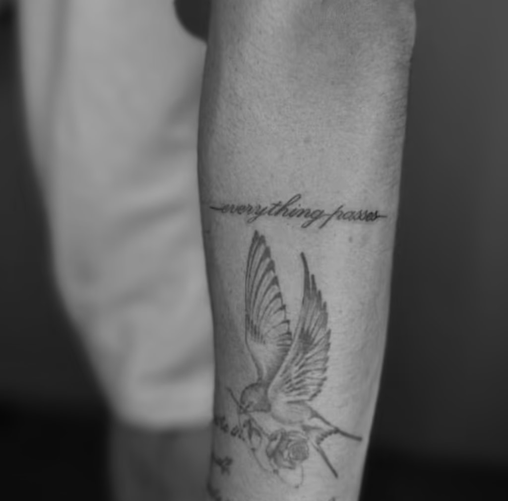 Romeo also has a bird tattoo