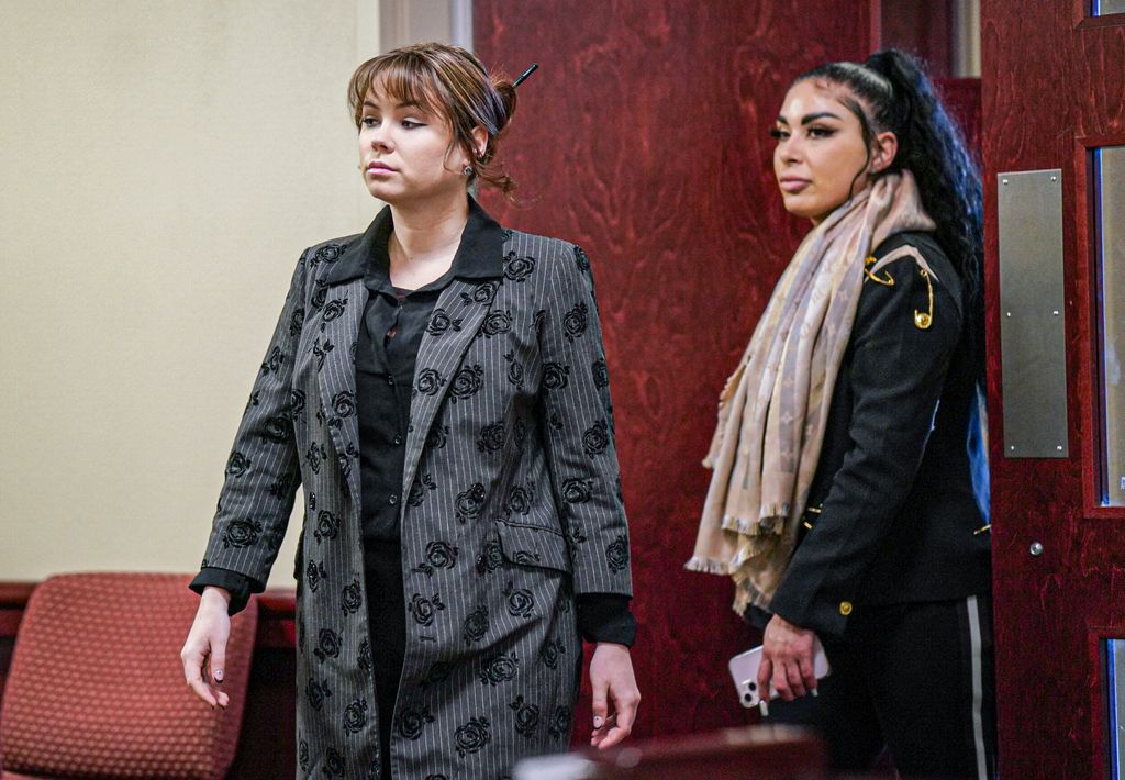 Hannah Gutierrez-Reed walks into the courtroom followed by Carmella Sisneros for the second day of testimony in the trial against her at the First Judicial District Courthouse on February 23, 2024, in Santa Fe, New Mexico. Gutierrez-Reed, who was working as the armorer on the movie "Rust" when a revolver actor Alec Baldwin was holding fired killing cinematographer Halyna Hutchins and wounded the film's director Joel Souza, is charged with involuntary manslaughter and tampering with evidence. (Photo by Gabriela Campos - Pool/Getty Images)