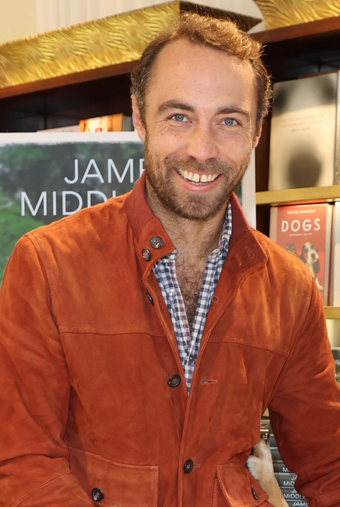 James Middleton in an orange jacket and plaid shirt