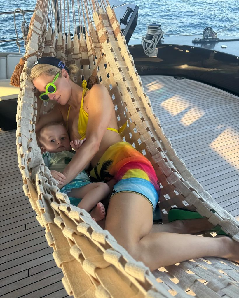 paris hilton yellow bikini on board a yacht with son phoenix