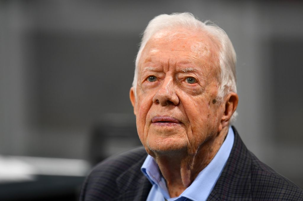 Former president Jimmy Carter prior to the game between the Atlanta Falcons and the Cincinnati Bengals at Mercedes-Benz Stadium on September 30, 2018