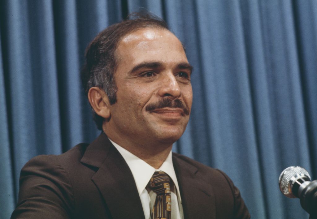 King Hussein in a black suit