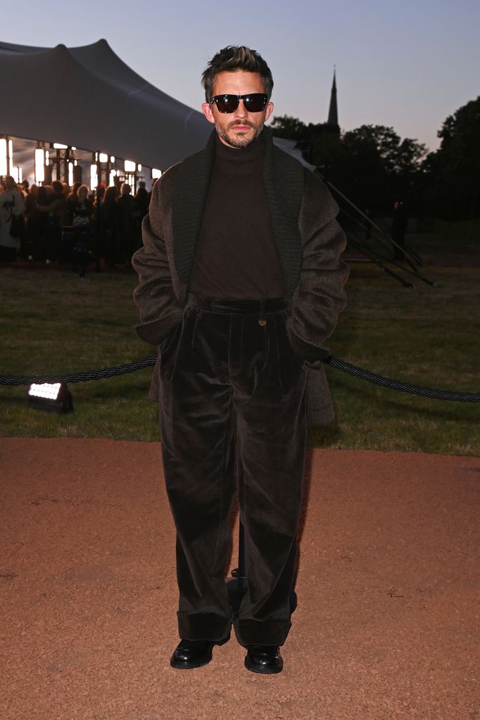 Jonathan Bailey arrives at the Burberry Summer 2026 show during London Fashion Week on September 22, 2025 in London, England. (Photo by Alan Chapman/Dave Benett/Getty Images for Burberry)