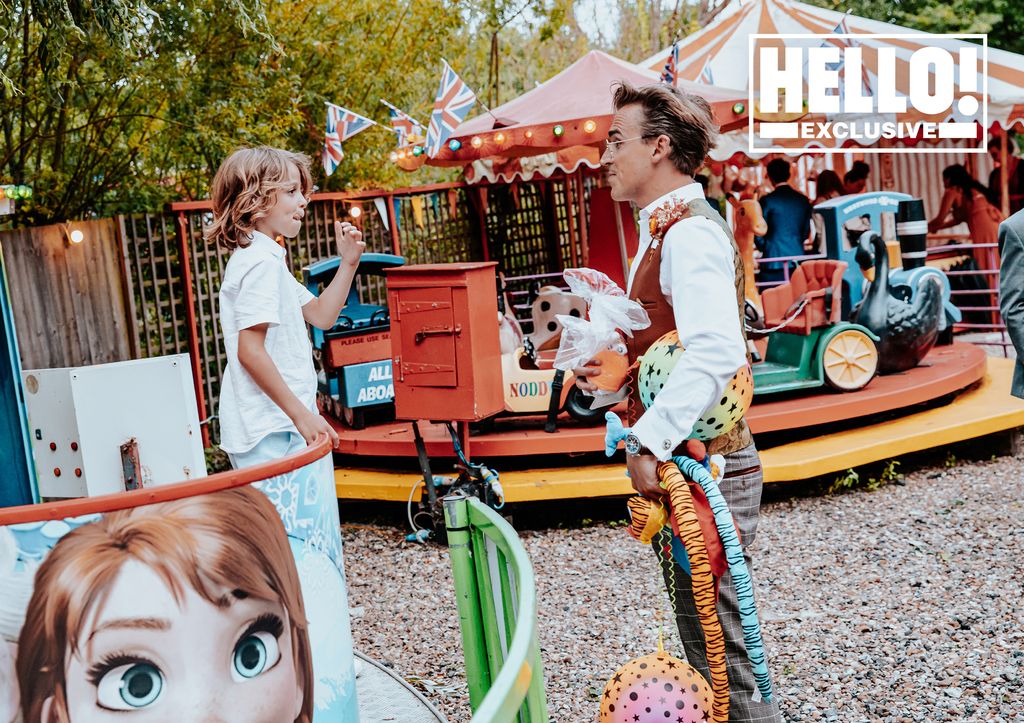 Tom Fletcher enjoying the rides with his son at Carrie's wedding
