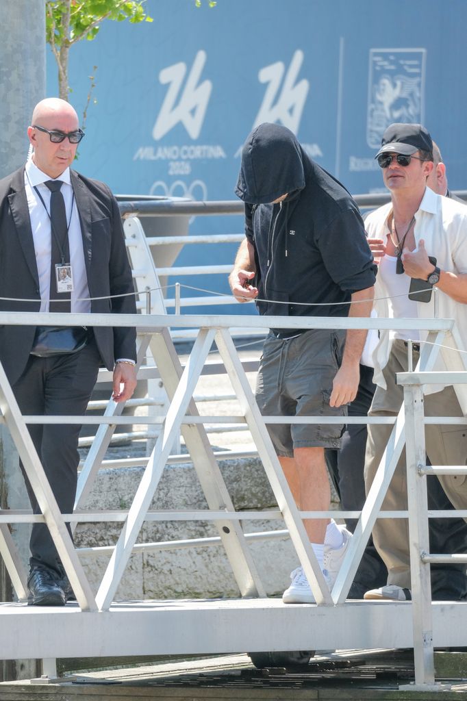 Orlando Bloom and Leonardo DiCaprio leave Venice