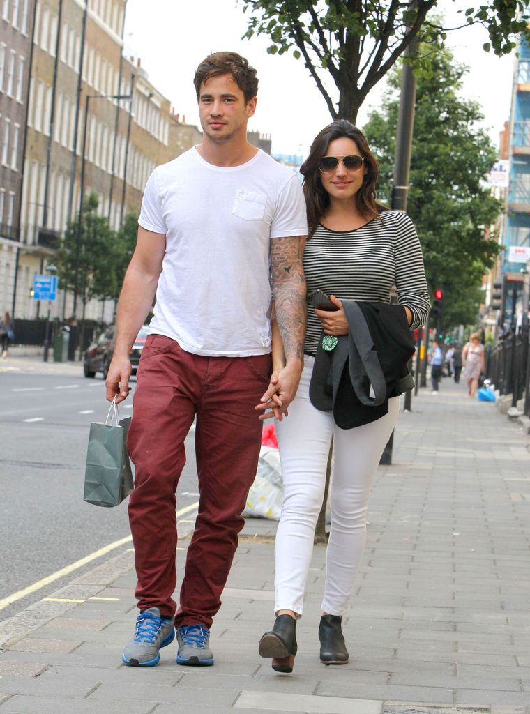 Danny Cipriani walks with Kelly Brook