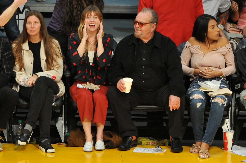 Lorraine and Jack watching a Laker's game