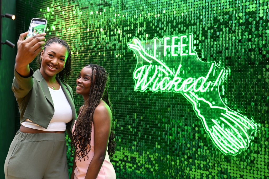 
Visitors at Wicked: For Good - The Experience, an immersive choose-your-own-adventure walk-through event celebrating the release of the new film