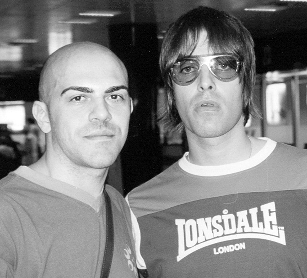 black and white selfie of Liam Noel Gallagher with fan Fabio D'Antonio